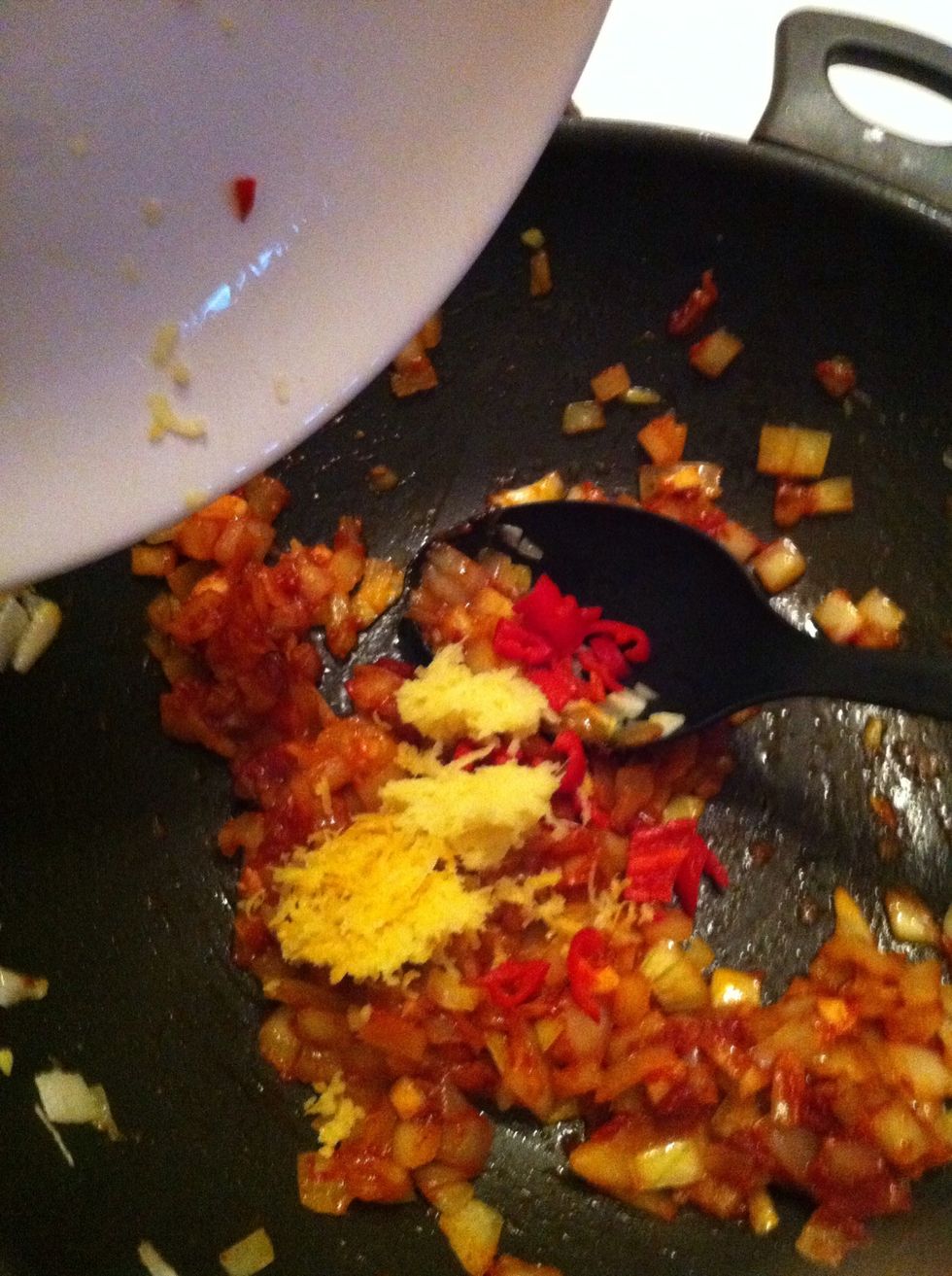 Add chopped chili, lemon zest and ginger.