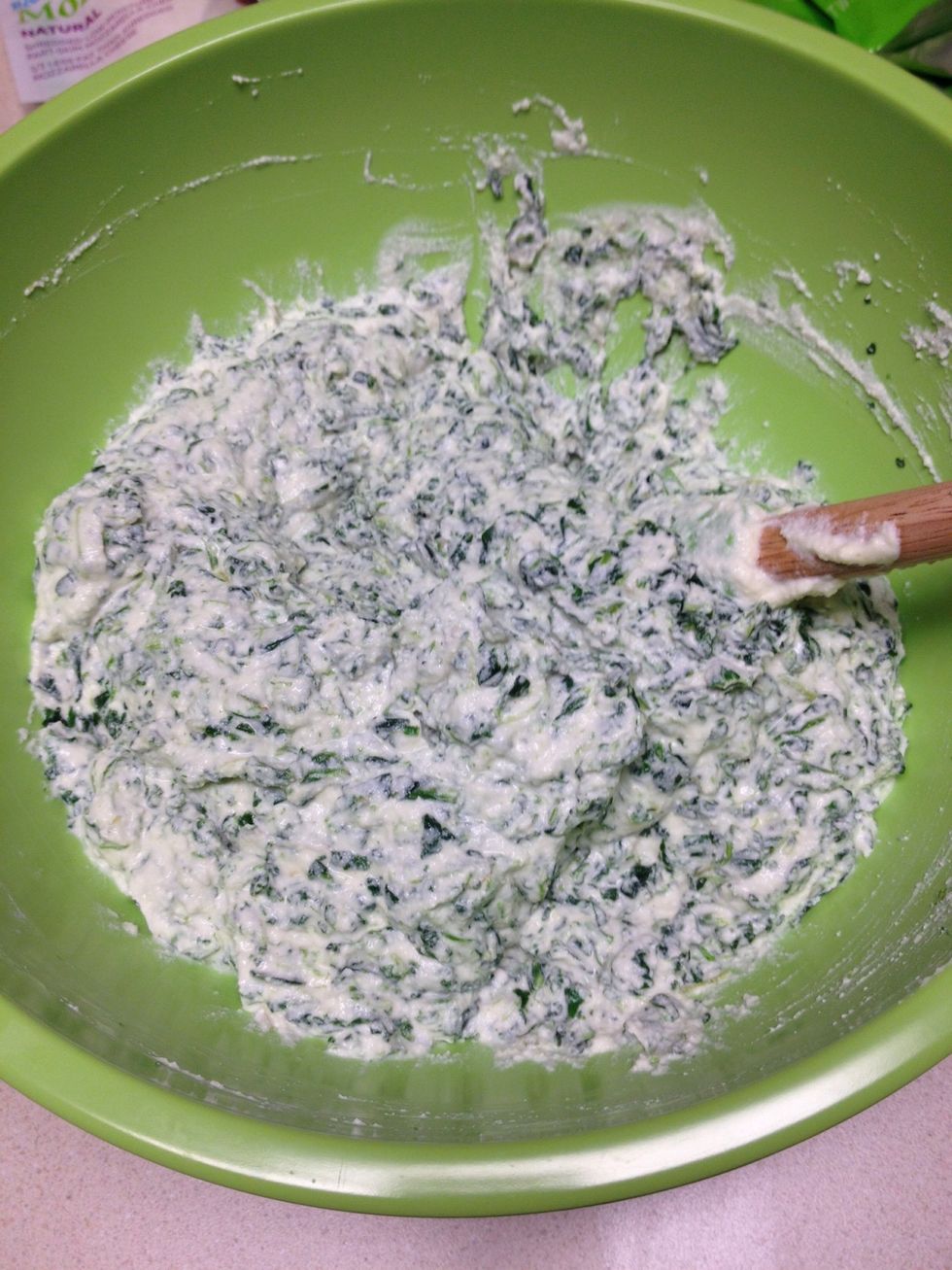 Add chopped, cooked spinach to the cheese