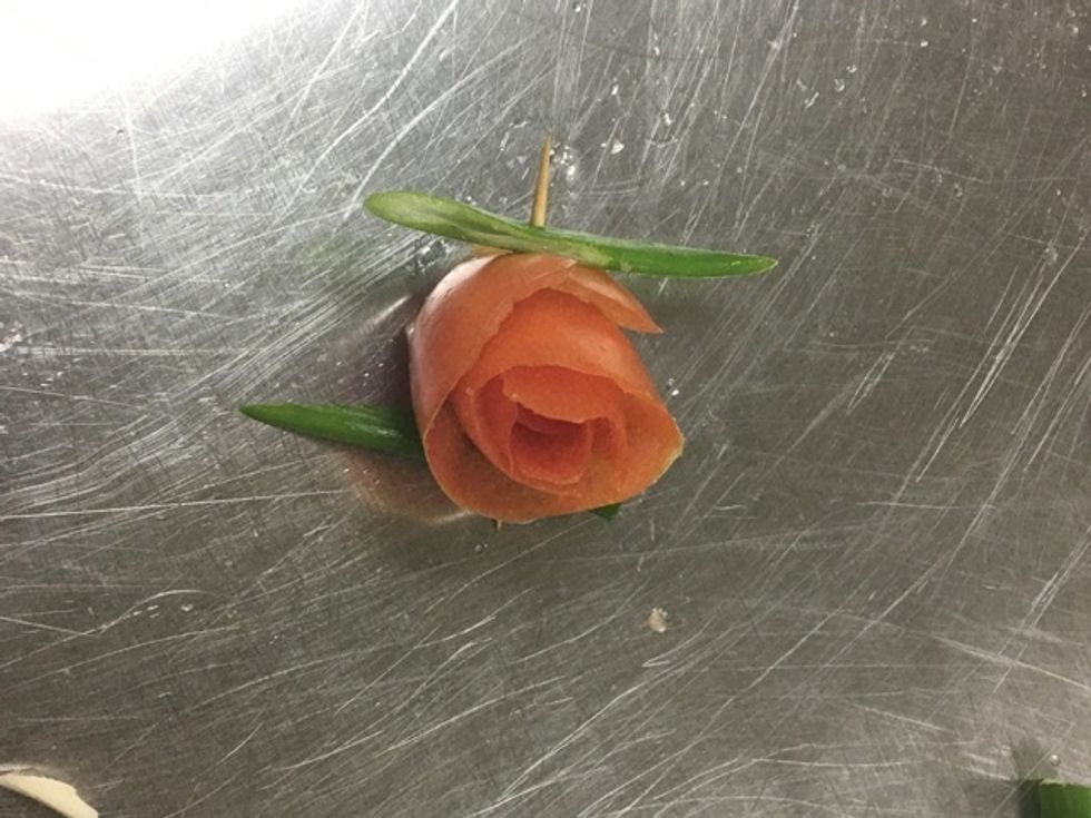 Add chopped green onion to symbolise the leaves of the rose