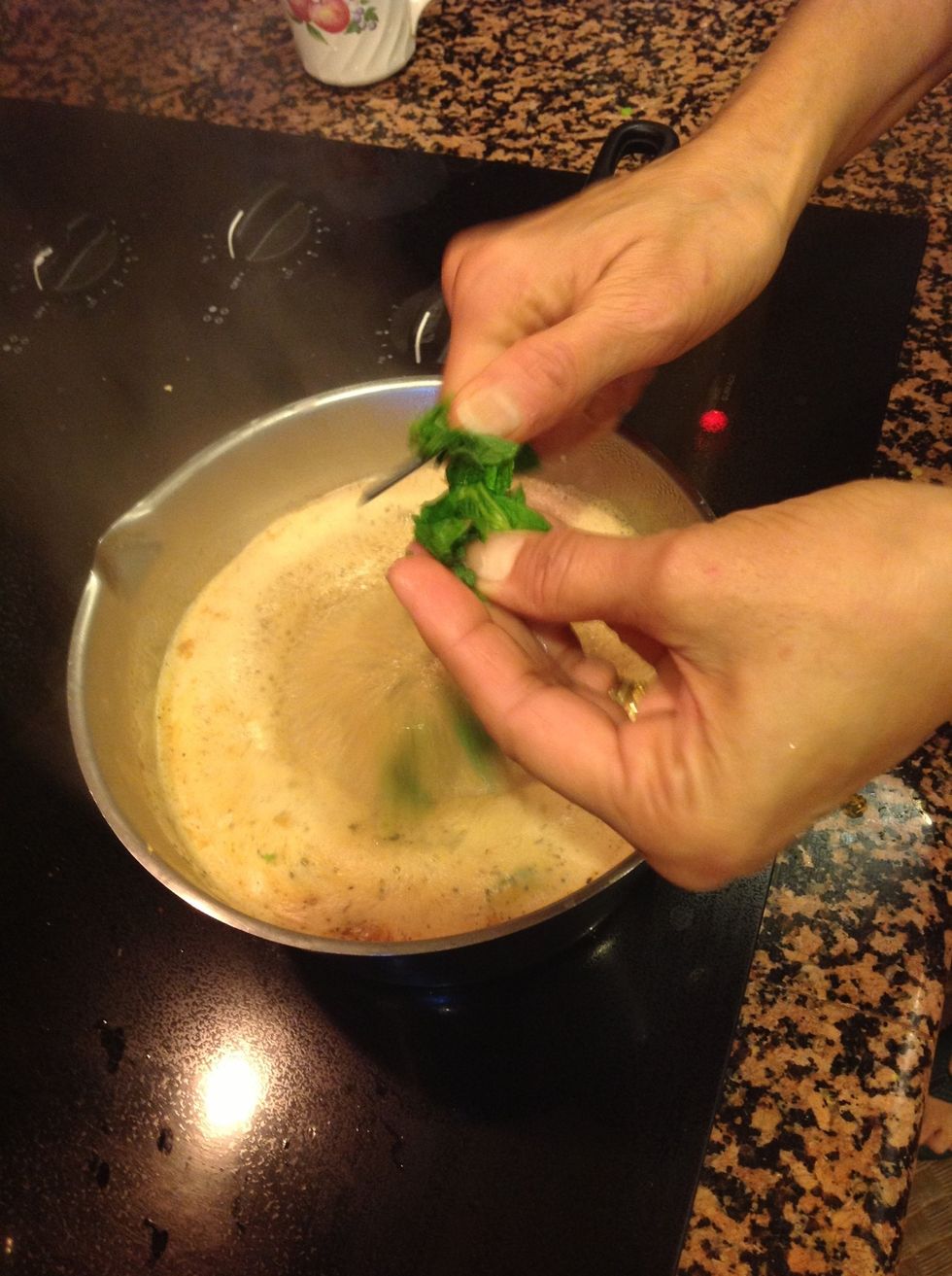 Add chopped mint and tulsi (optional) leaves