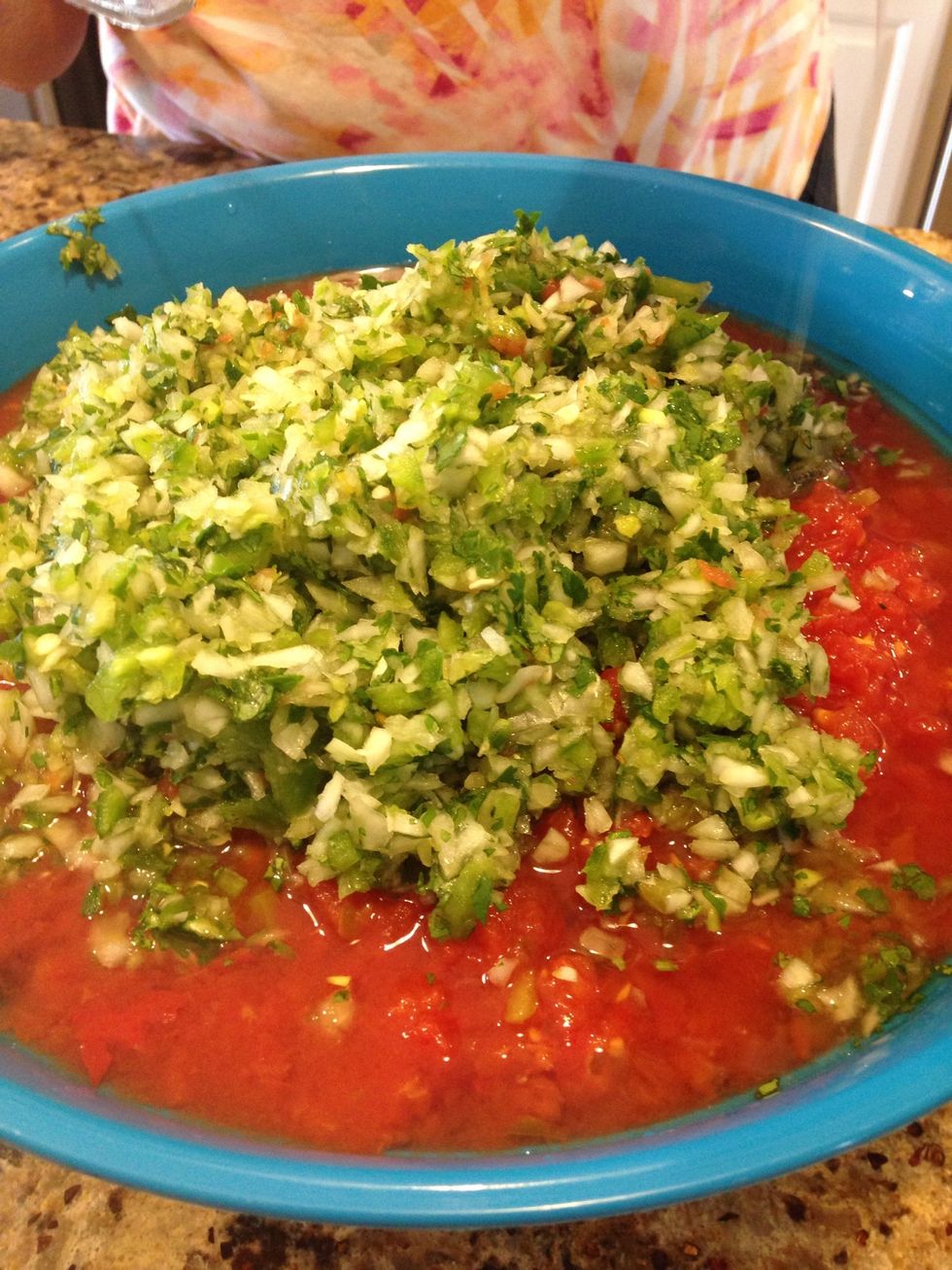 Add chopped mixture to tomatoes in bowl.