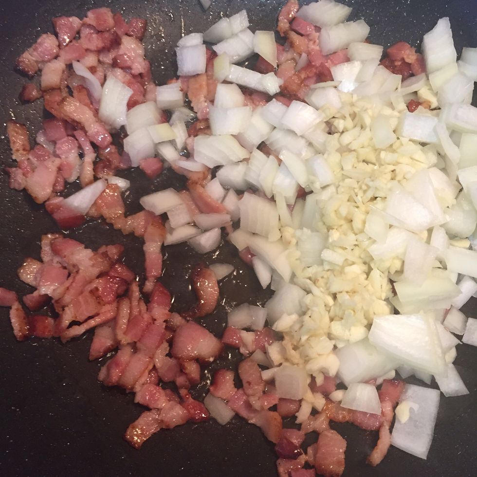 Add chopped onion and miced garlic.