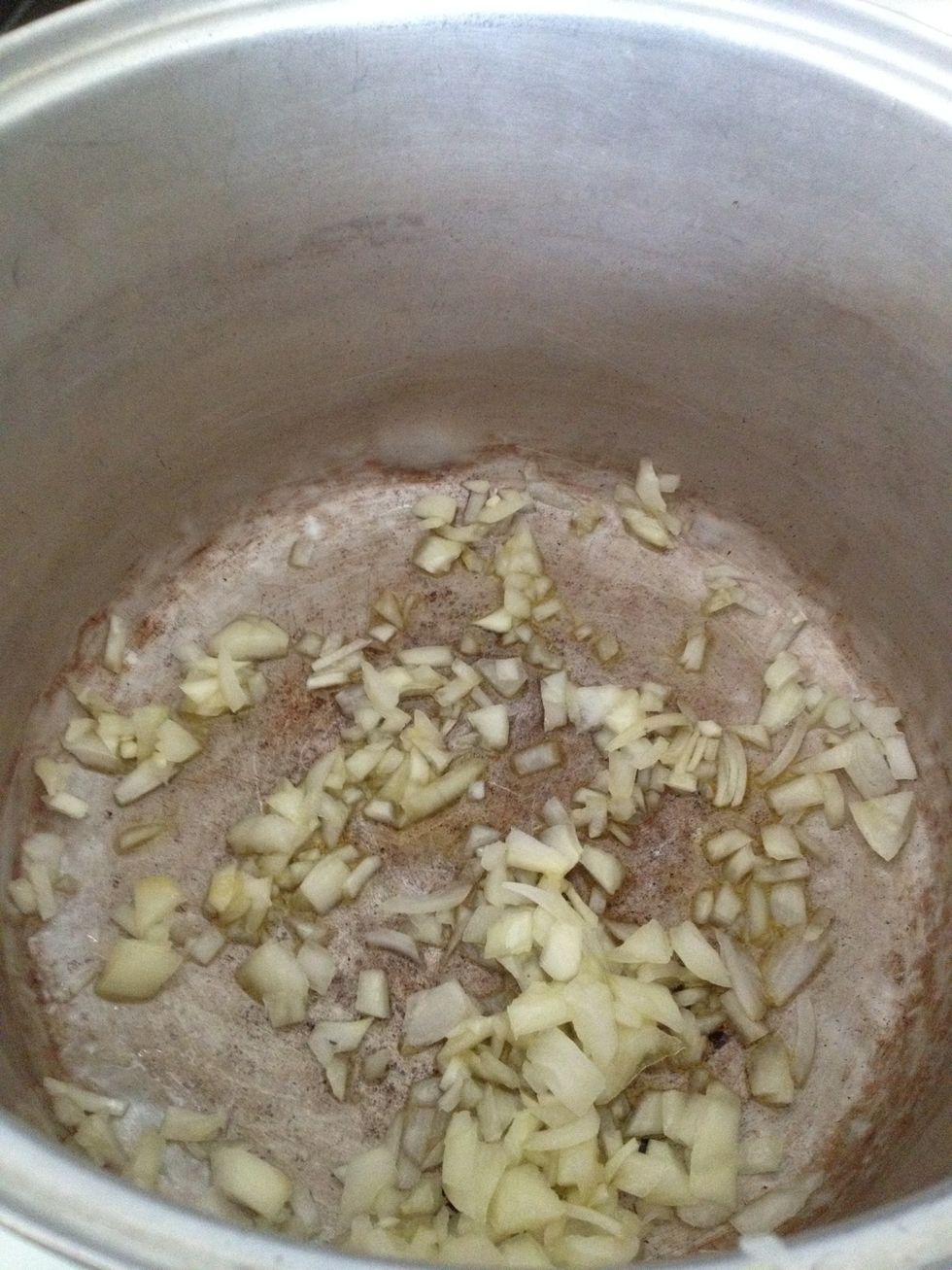 Add chopped onions and cook until transparent.