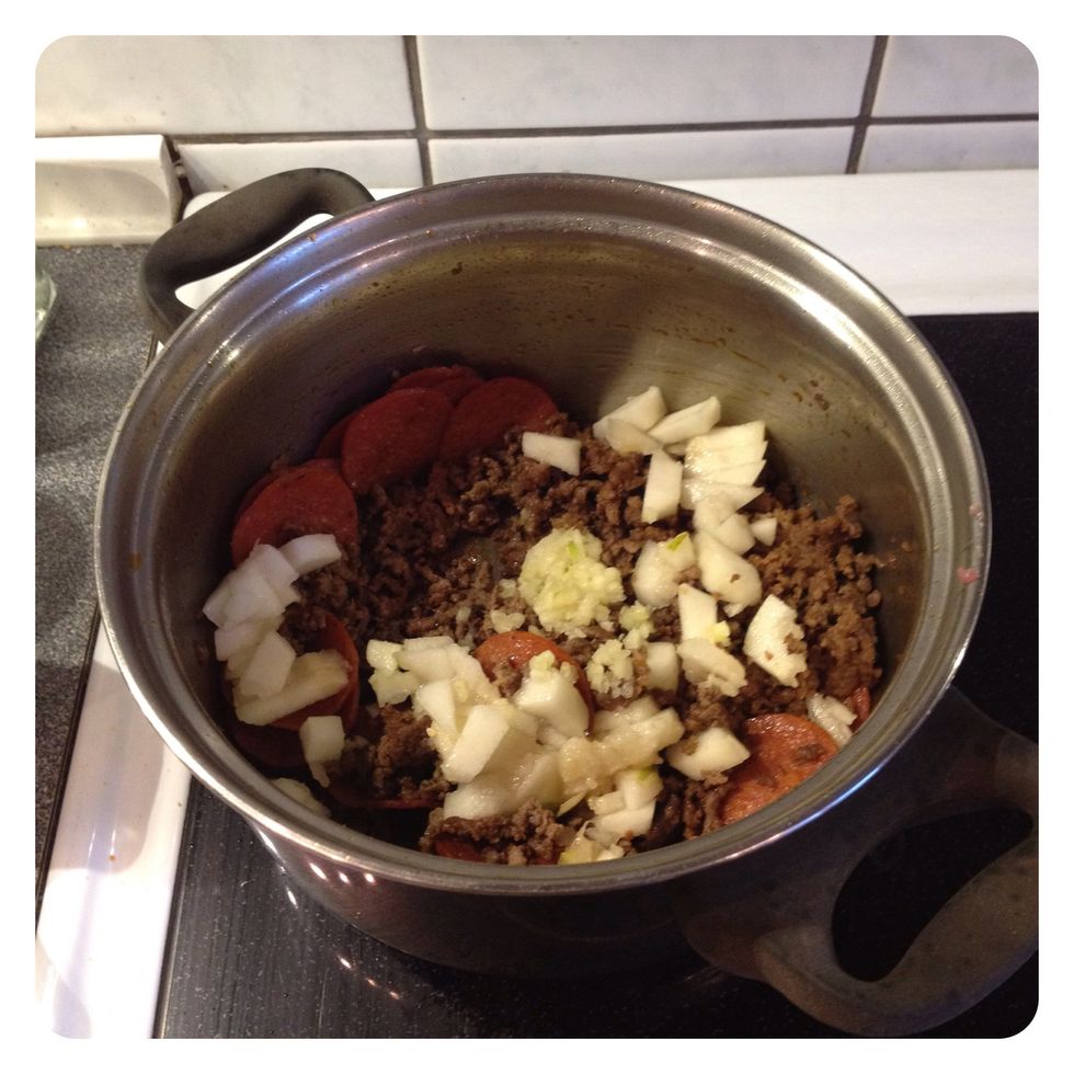 Add chopped pear, peeled and chopped garlic and parsley very finely chopped...