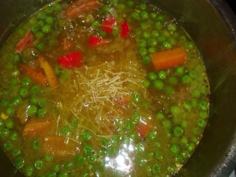 Add chopped tomatoes  and reduce heat and simmer for about 30 minutes ,or until  the  vegetables are tender when pierced with a fork