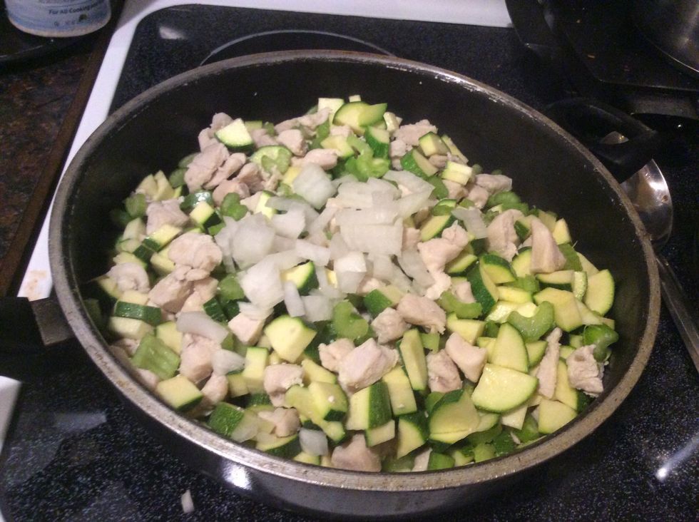 Add chopped vegetables into the chicken