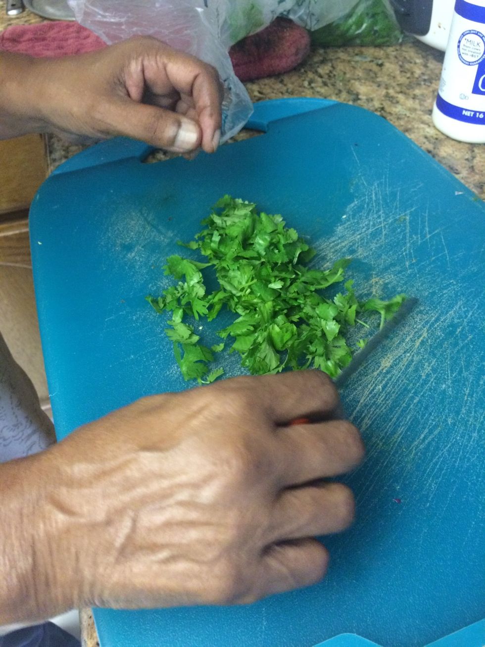 Add cilantro and mix into butter chicken