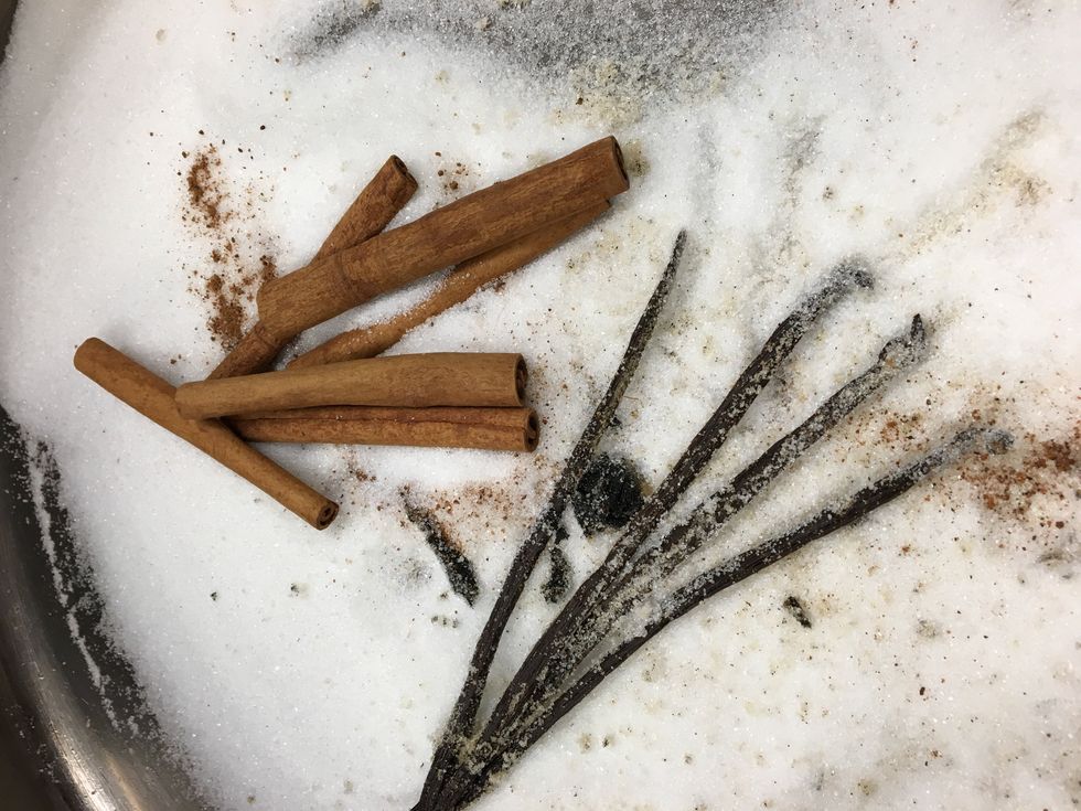 Add cinnamon and vanilla bean, rub The vanilla bean with the sugar to remove all the seeds