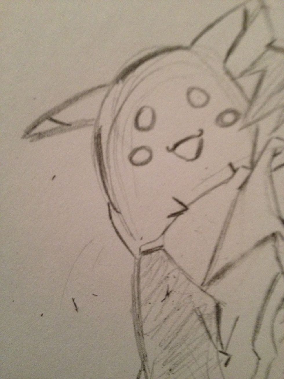 Add circles for eyes and checks curved lines near the points of his ears and mouth