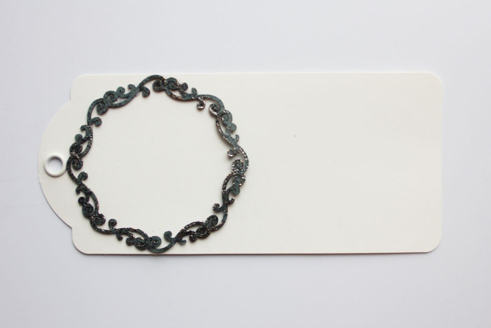 Add circular frame to the left side of the tag.