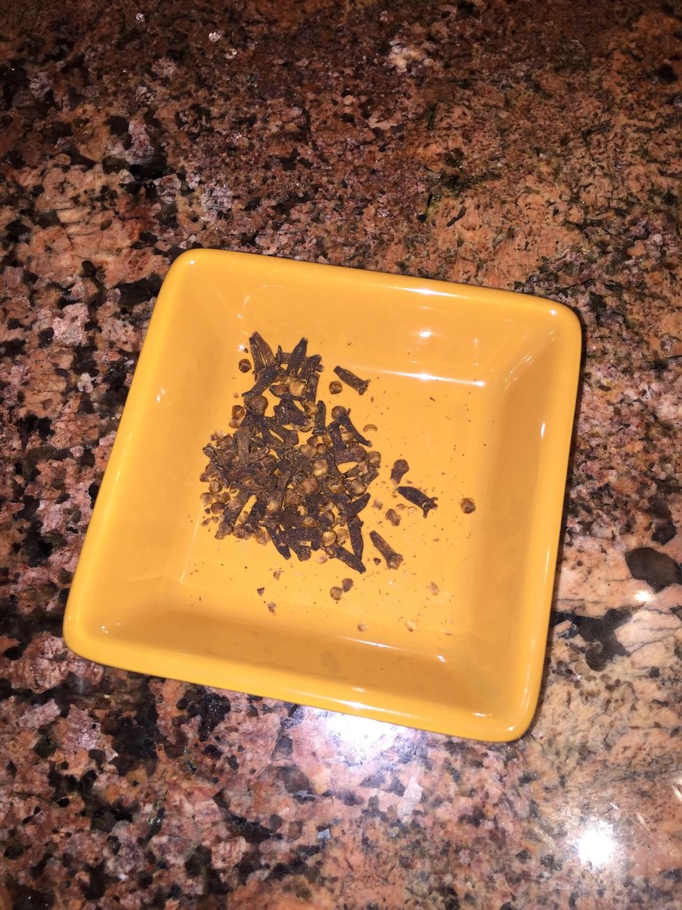 Add cloves to a bowl