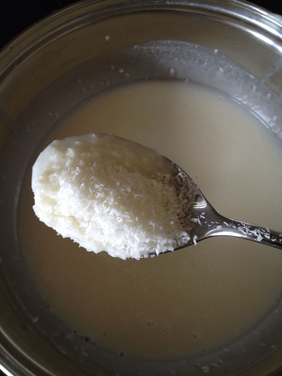 Add coconut flakes. After leave to cool completely.