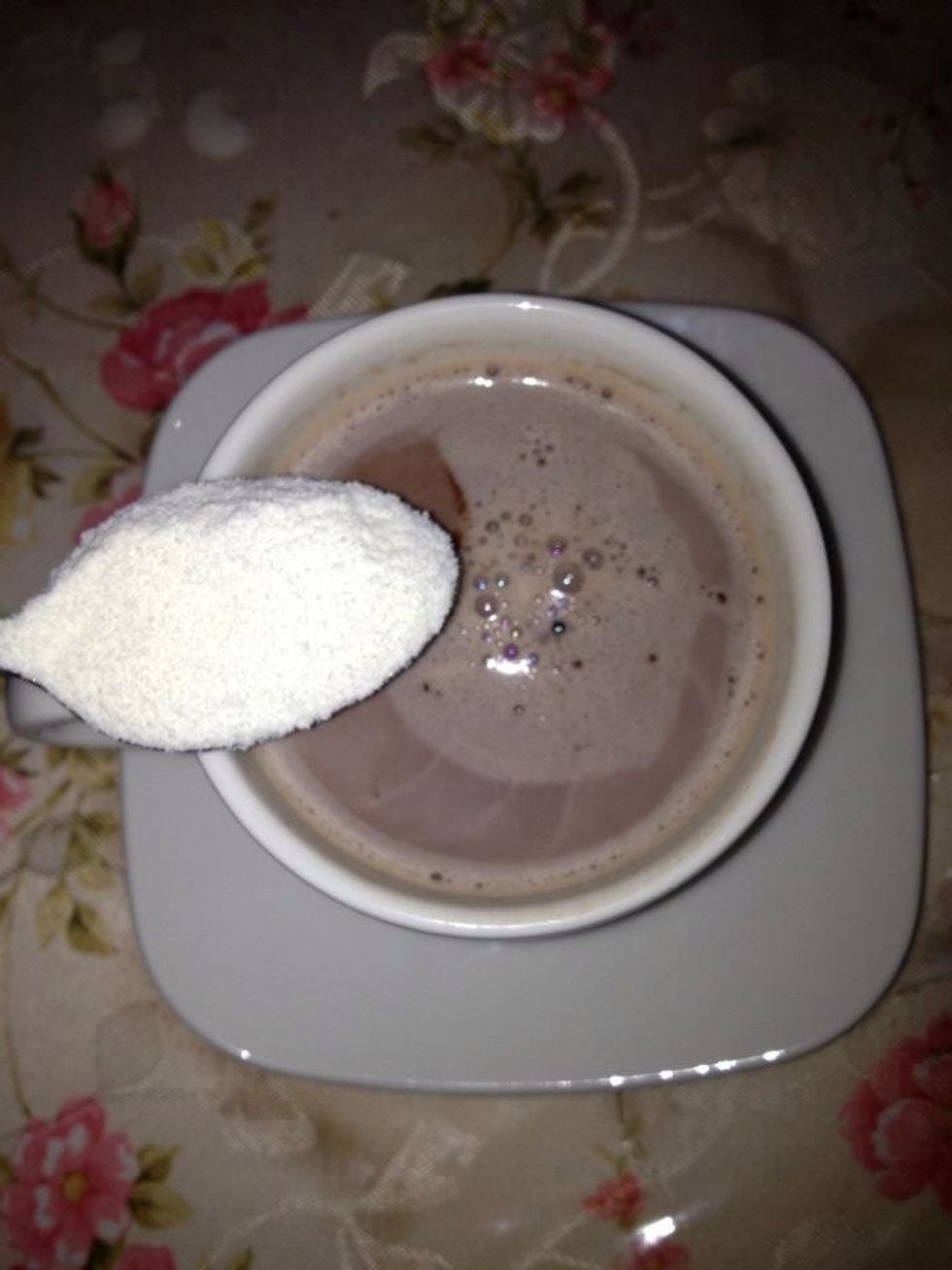 Add coffee mate. Then stir it well.