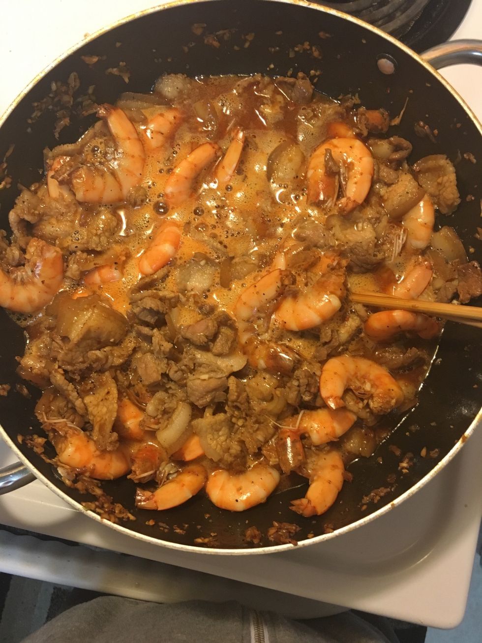 Add Coke, increase to high heat for a few minutes, stir well, decrease to low heat and let shimmer for 20 minutes