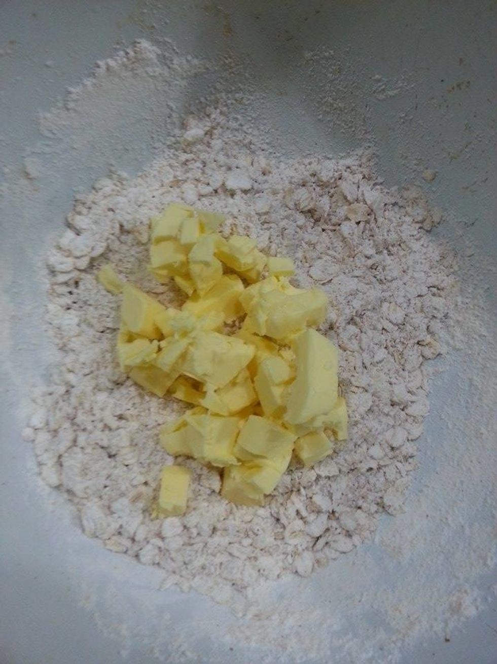 Add cold butter that are cut into small cubes.