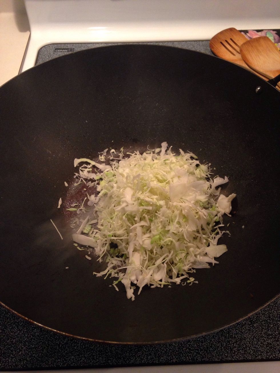 Add coleslaw. Stir fry 30 seconds.