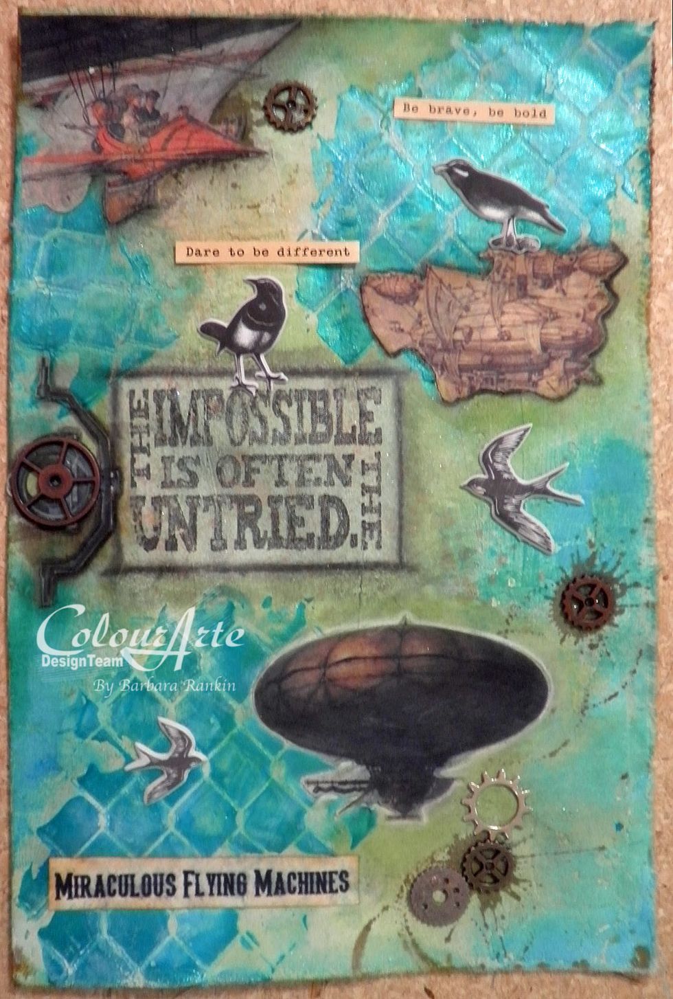Add collage images from Altered Pages, stickers, metal embellishments, and add additional colors to finish your page. Use charcoal pencils in black and/or white to make the images pop off the page.