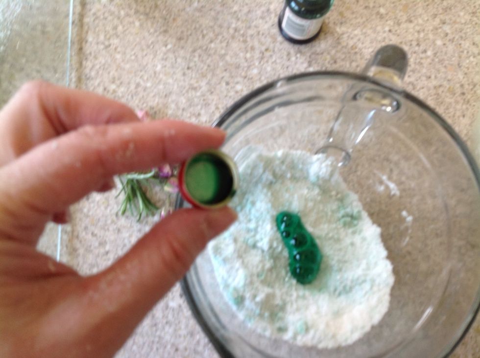 Add colour. I use half to two cap fulls per cup of mixture. If it fizzes, quickly cover it with dried ingredients to stop it fizzing. Mix in well.