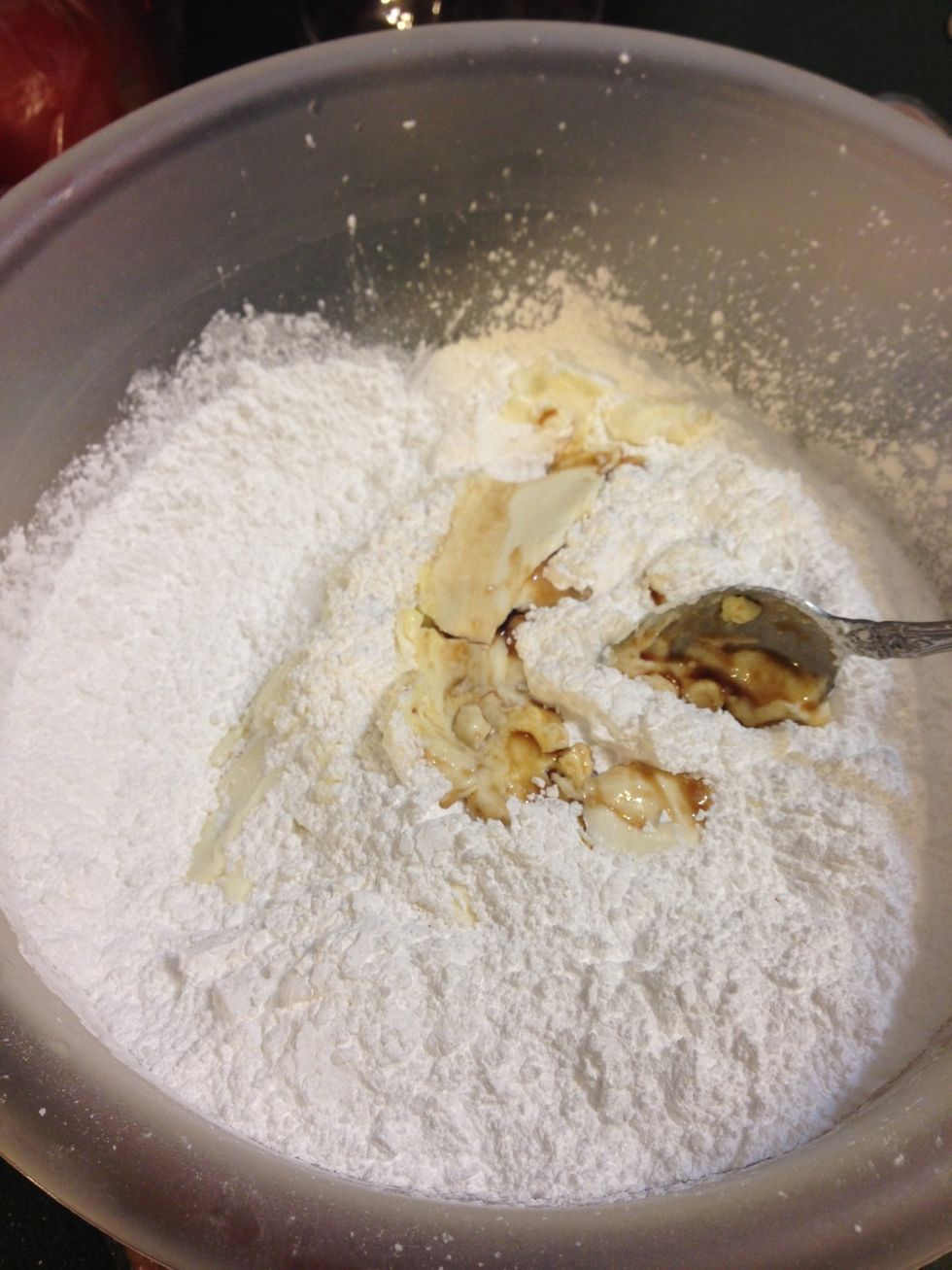 Add confectioner's sugar,cream cheese, butter and vanilla extract to bowl and mix until smooth