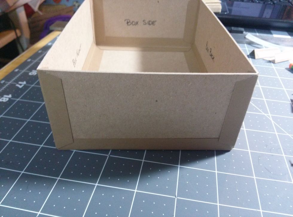 Add construction strips to the sides of the outside of the box as well.