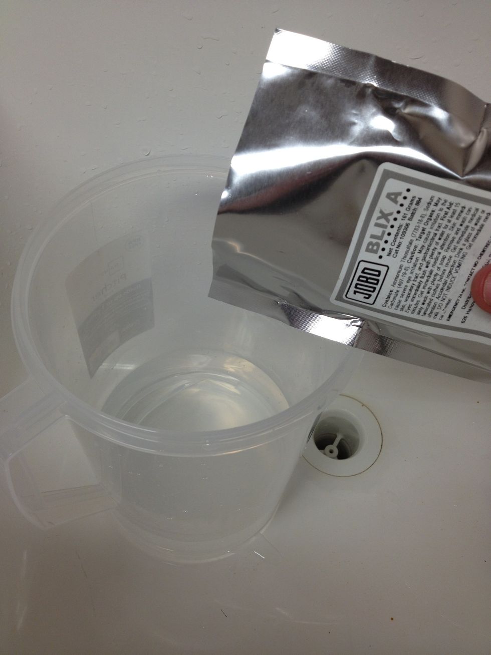 Add contents of Blix A packet while stirring continuously.