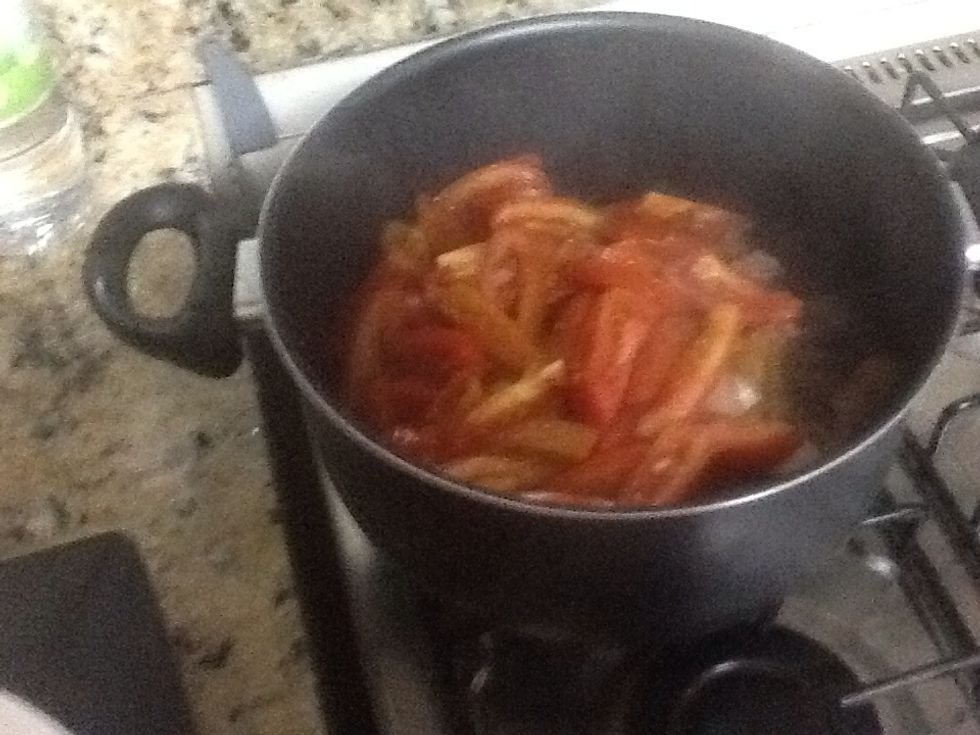 Add cooked meat, reduced onions and tomatoes.