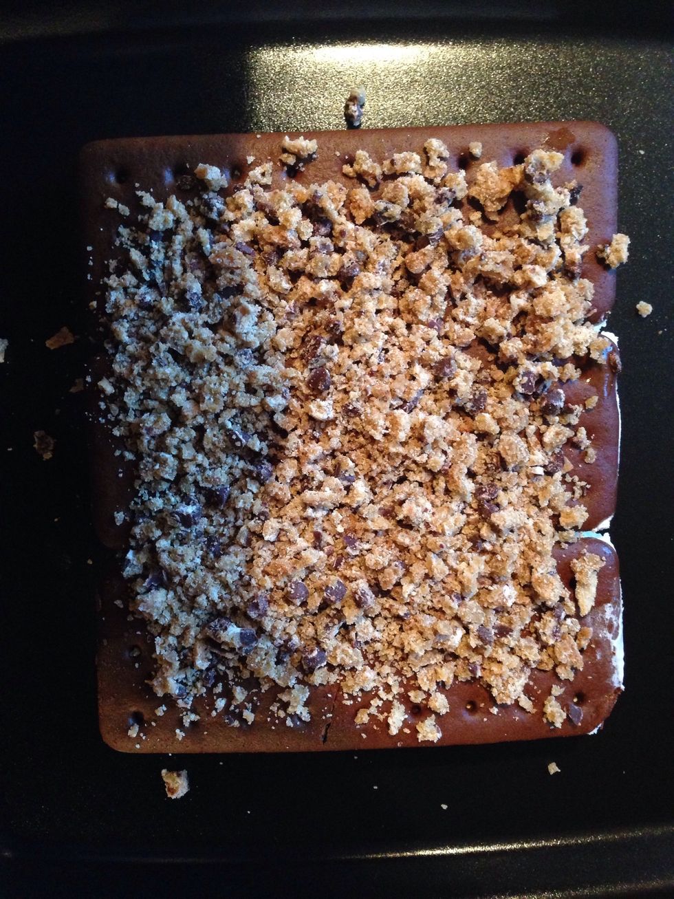 Add cookie crumbs to the top of the ice cream sandwiches