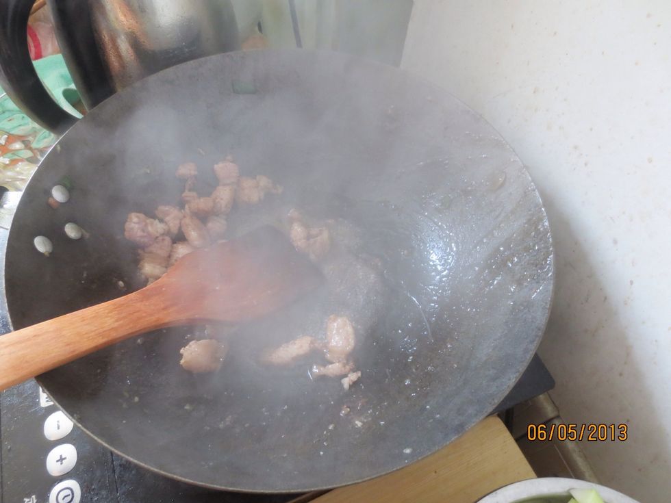 Add cooking wine and stir