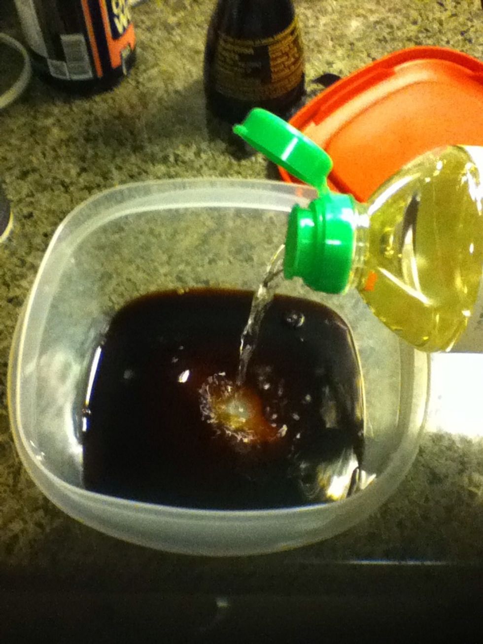 Add cooking wine. Any white wine or sake would work. Maybe about 2 big table spoons or so.