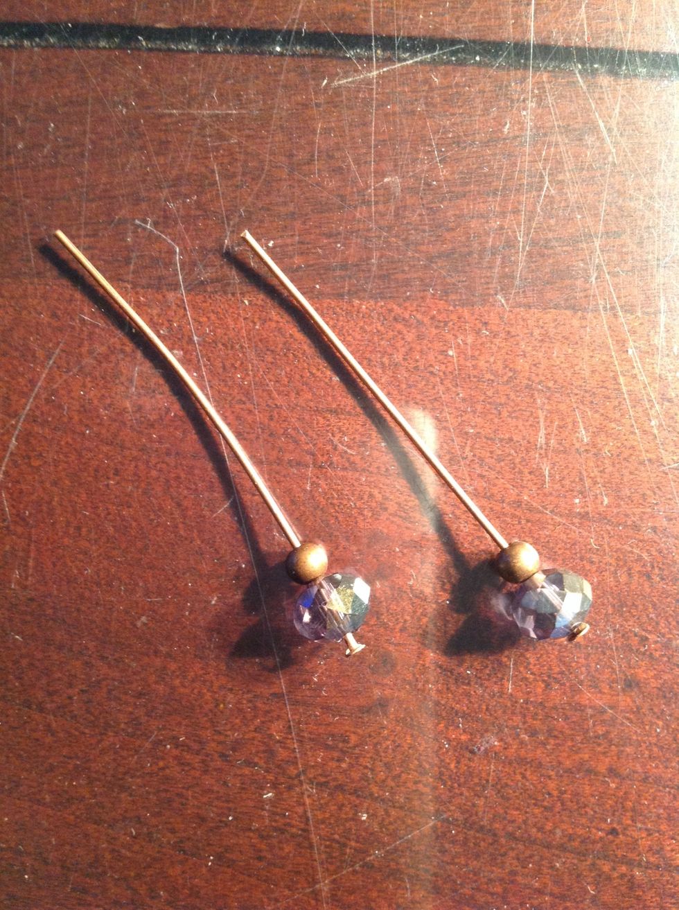 Add copper beads on top of the crystal beads on the headpin