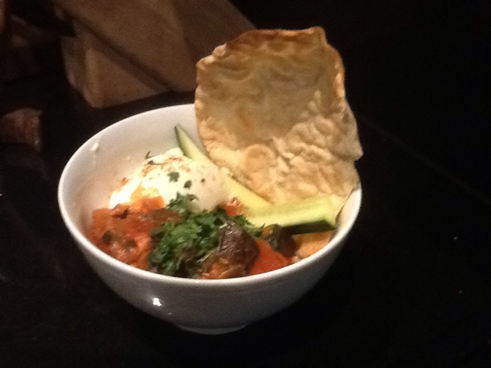 Add coriander leaves and yogurt for taste Papadums and roti bread is optional but recommended Note this dish is better a day after it is made