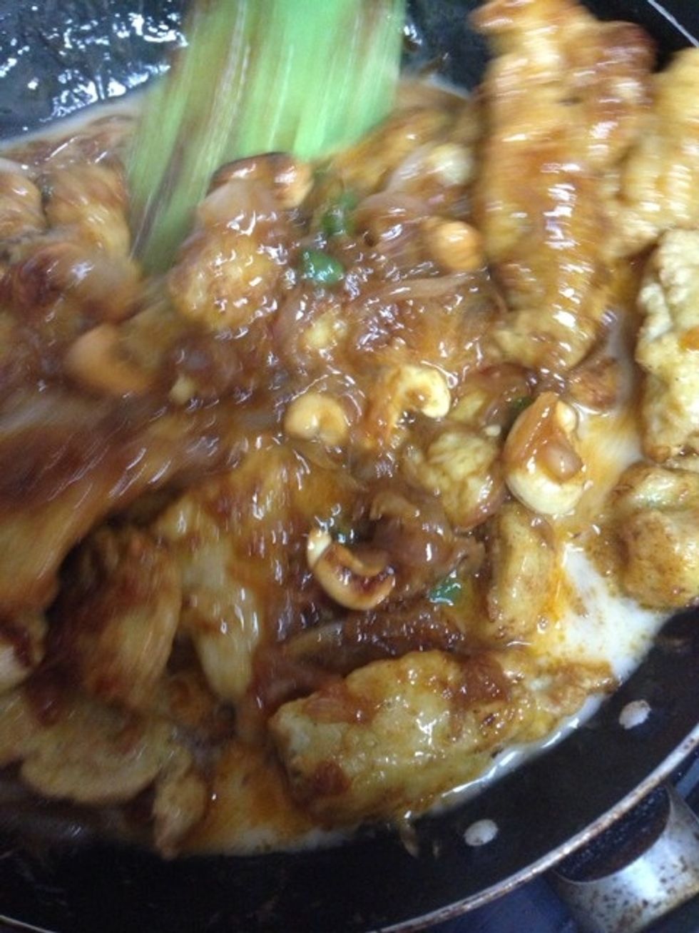 Add corn flour honey mix. Too much heat at this stage will make the corn flour stick. Which is why switch off the heat.
