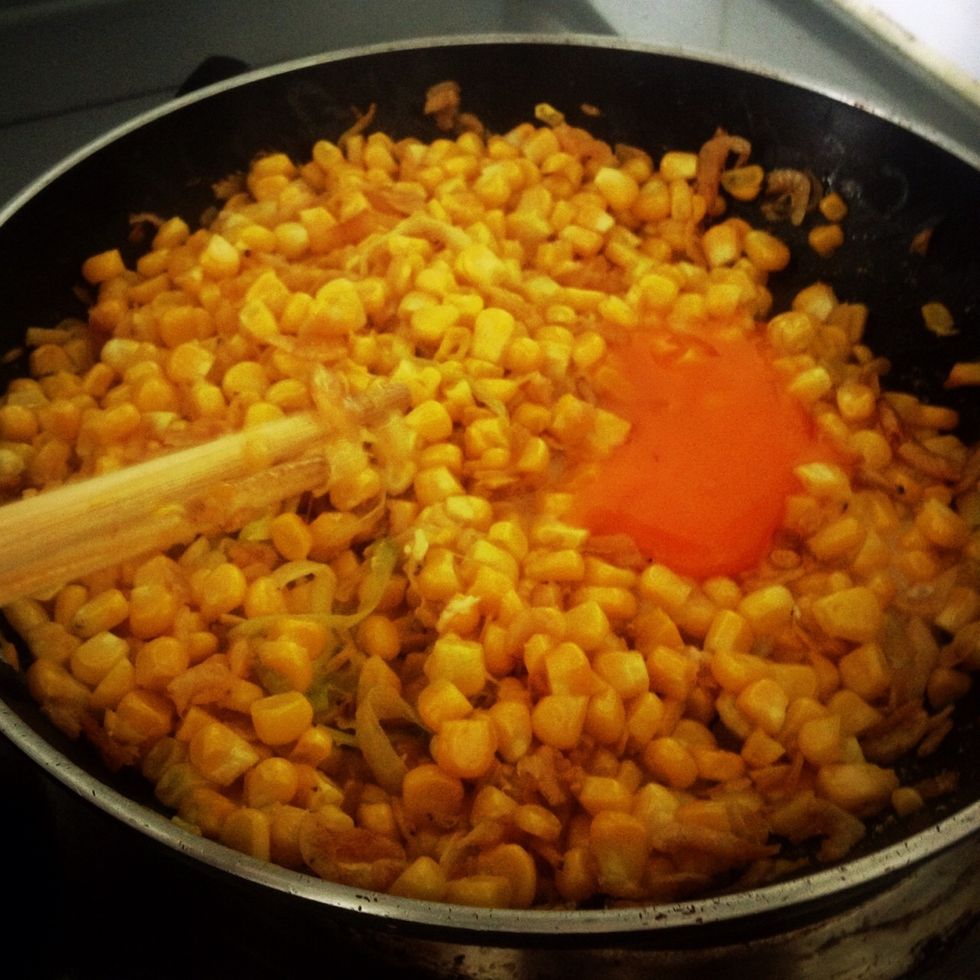 Add corns, eggs then stir