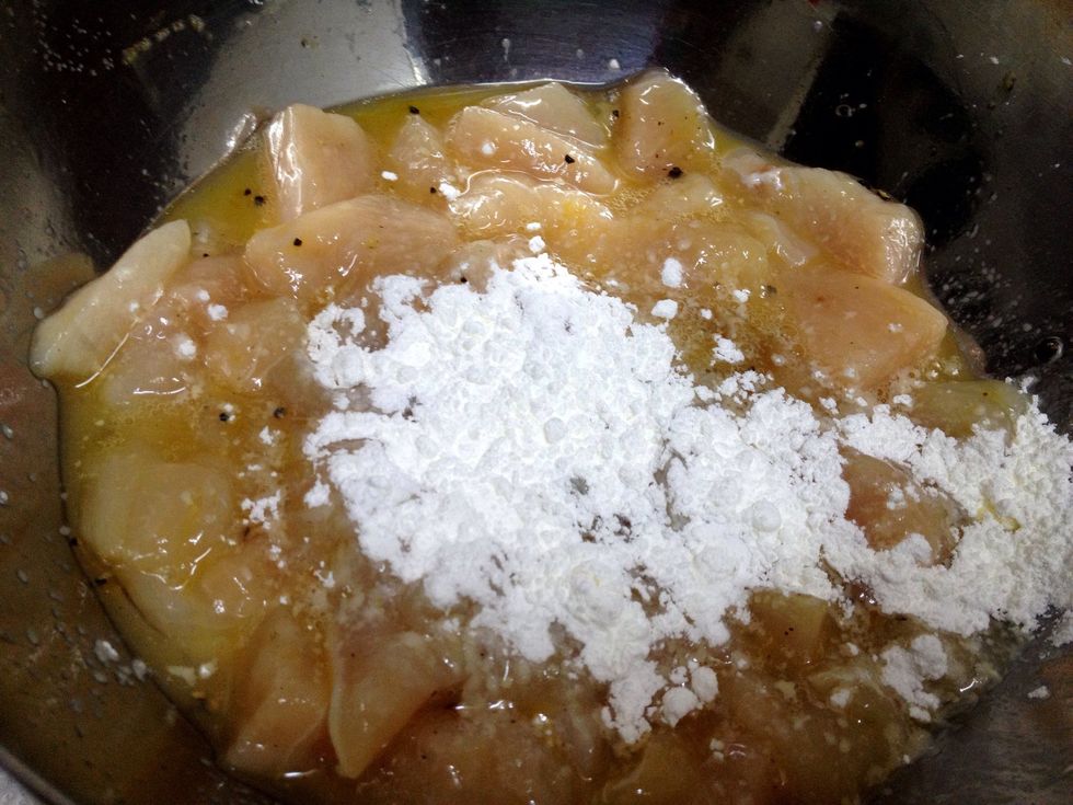 add cornstarch then mix lightly - dont overdo the mixing. (P.S. the cornstarch seals off the chicken when you fry it, making it crunchy on the outside but tender and juicy inside)