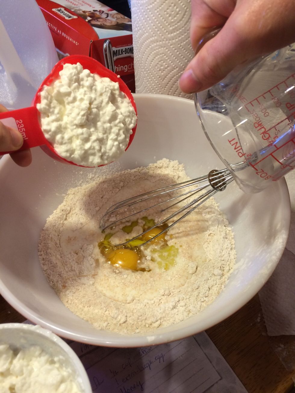 Add cottage cheese, milk, egg, and oil.
