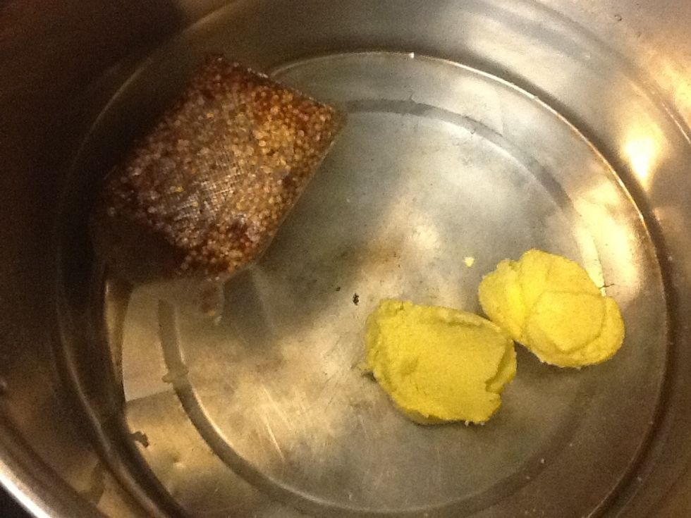 Add crab boil and two heaping of chicken base to half a pot of water..