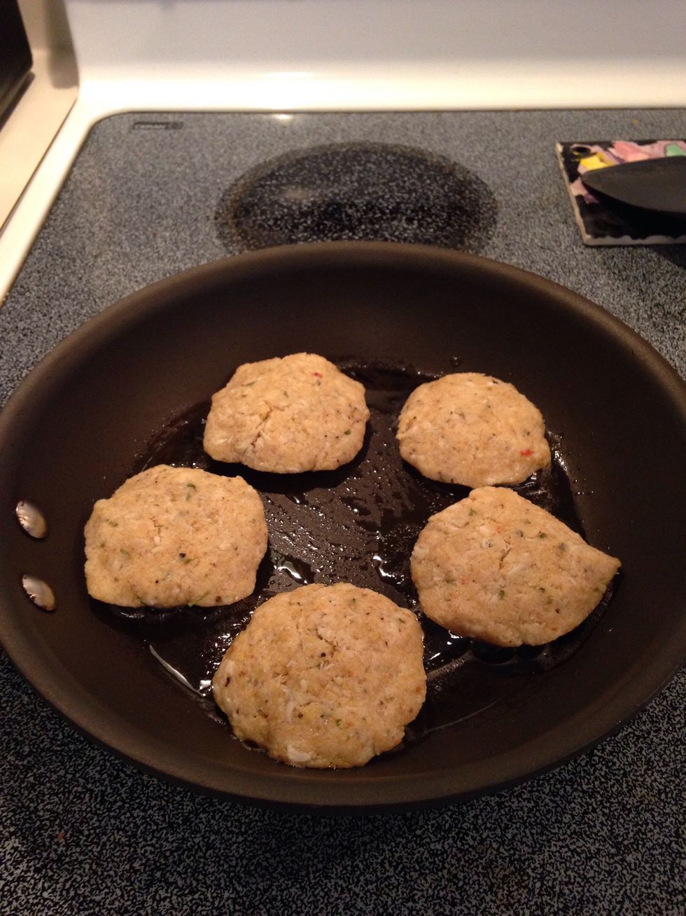 Add crab cakes.