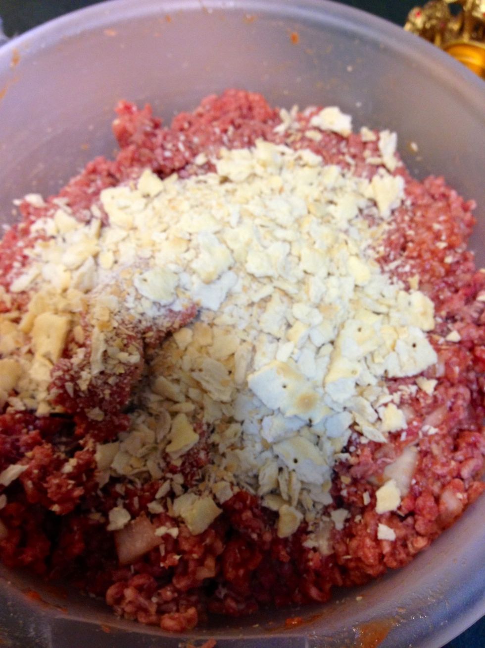 Add crackers.  (I just crush them by hand.) Just enough so meat will hold together firmly.