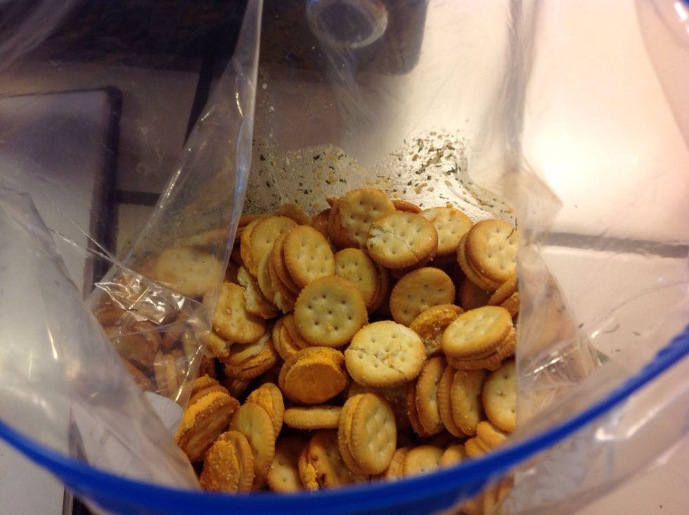 Add crackers into the bag.