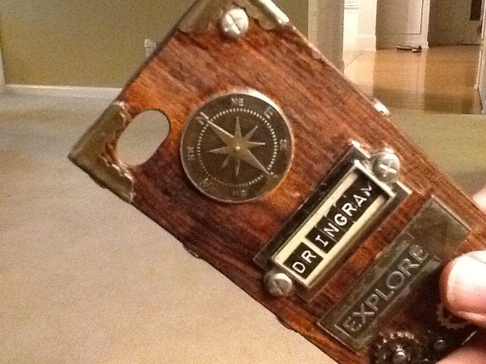 Add craft supplies to phone case with hot glue or super glue. Most of the case is covered with super epoxy glue and you can choose to cover with a spray finish or leave it natural. I sanded mine.