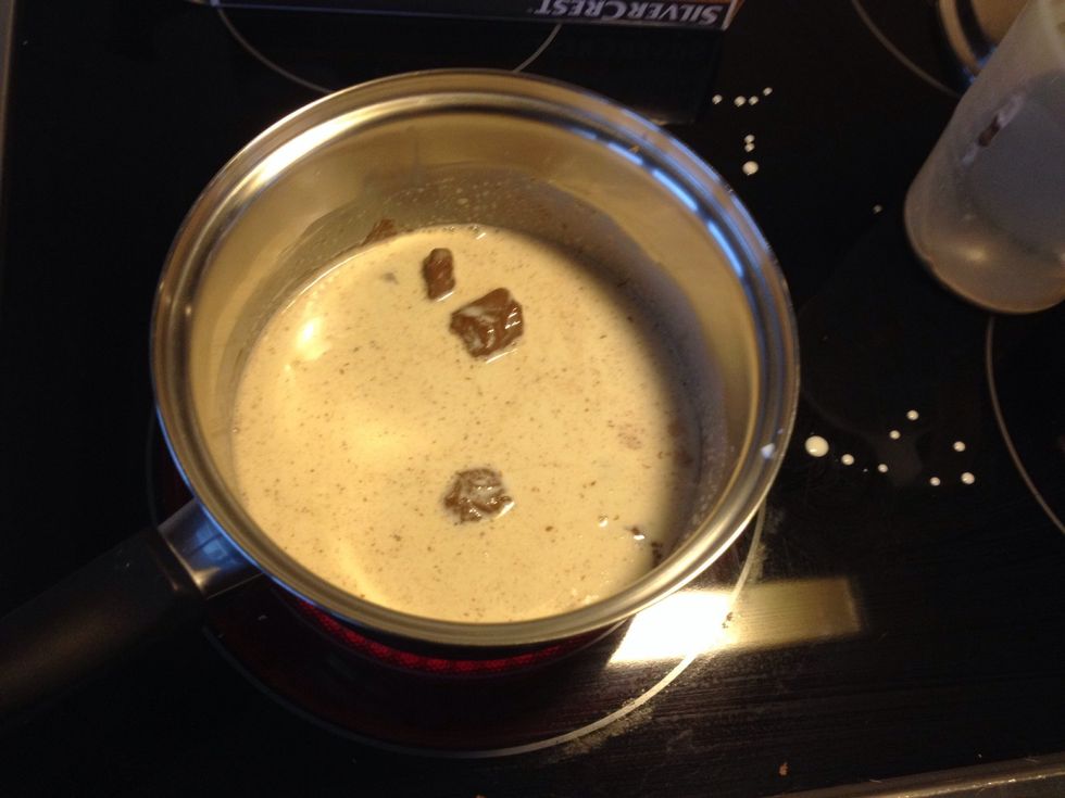 Add cream and nougat to a pan