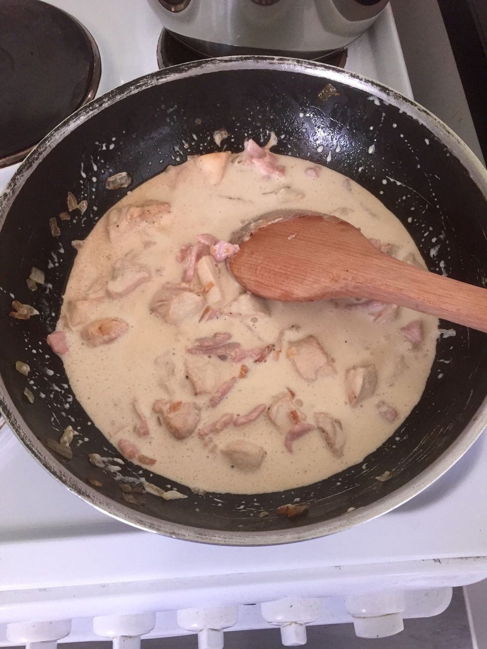 Add cream and reduce