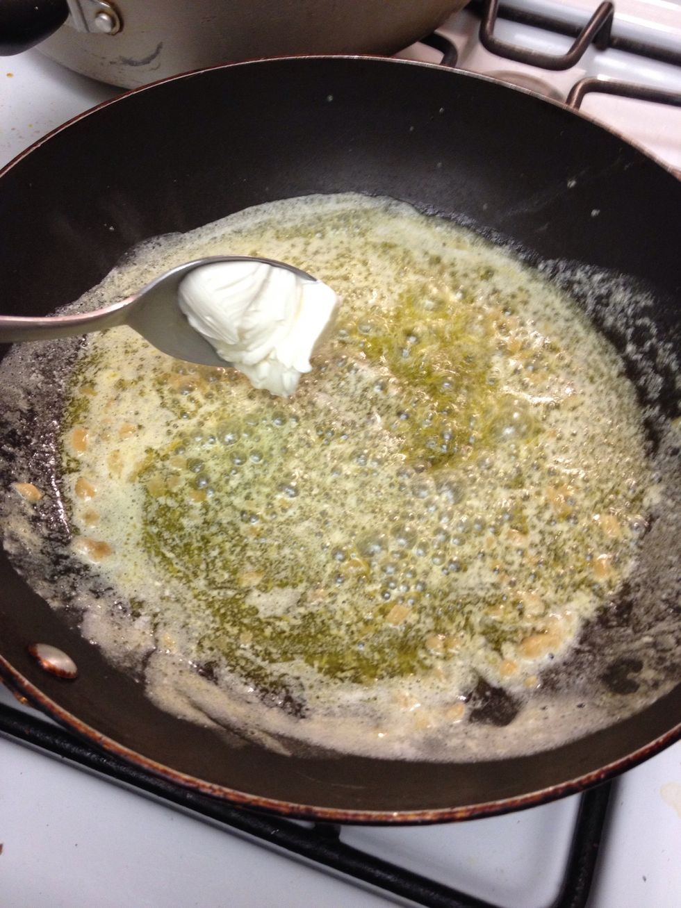Add cream cheese to the pan. Wait until it starts to melt a little, before adding the heavy cream. \u27a1