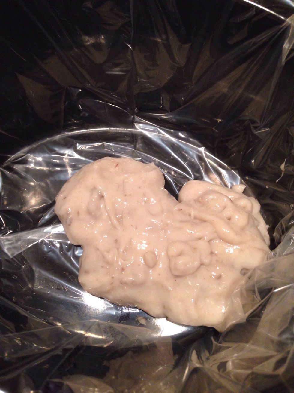 Add cream of mushroom soup to crockpot.