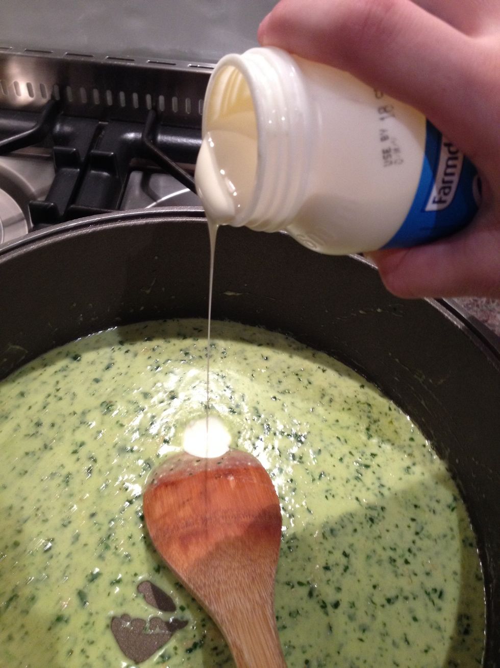 Add cream to pesto