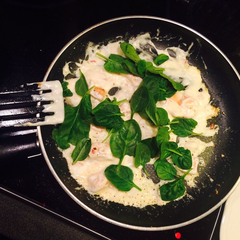 Add creme fraiche, and lemon juice. Stir and add spinach.