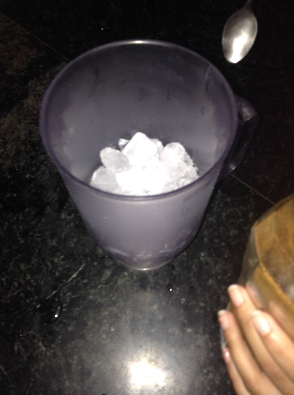 Add crushed ice to the food processor