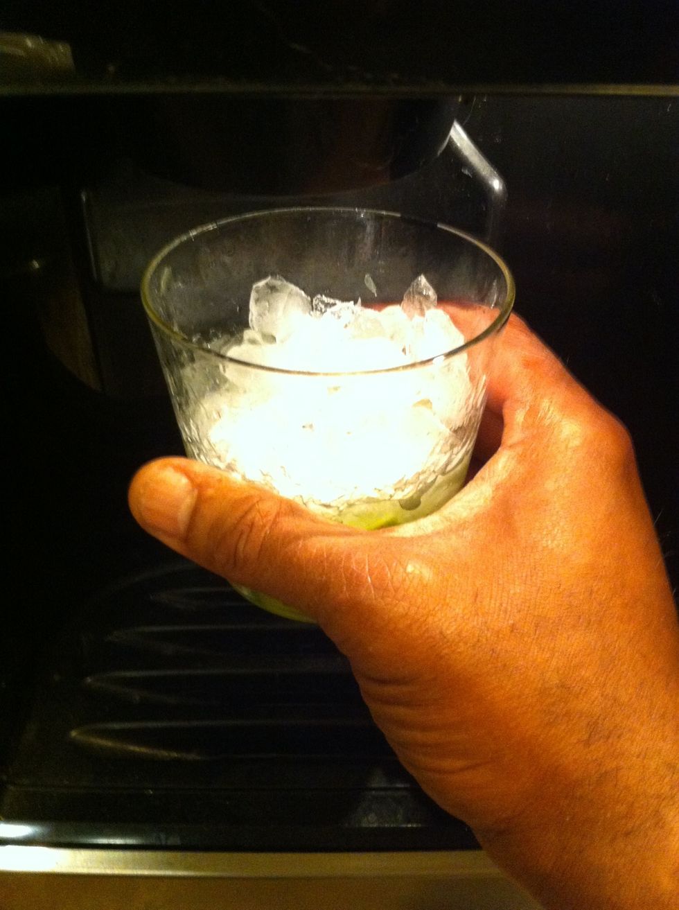 Add crushed ice to your glass.