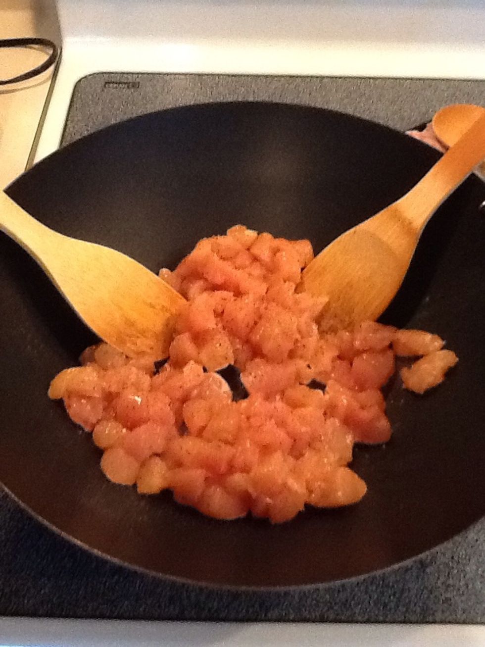 Add cubed chicken and coat with salt and pepper.