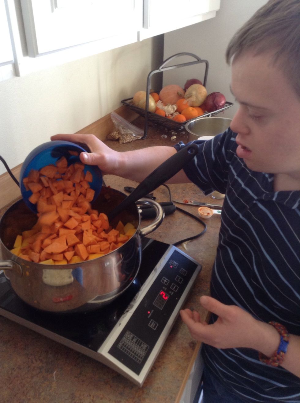 Add cubed sweet potato to pot